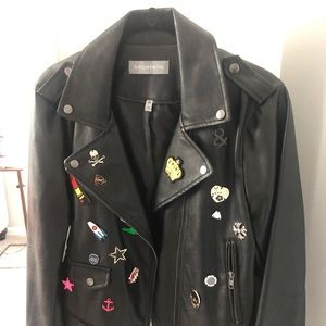 Faux leather jacket with patches and charms